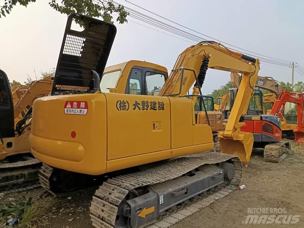 Komatsu PC120 Vidutinės galios ekskavatoriai 7-12 t