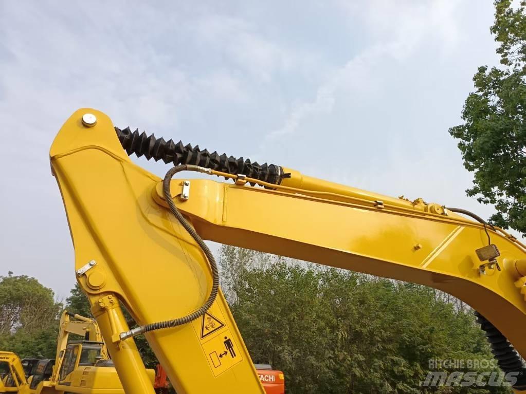 Komatsu PC120 Vidutinės galios ekskavatoriai 7-12 t