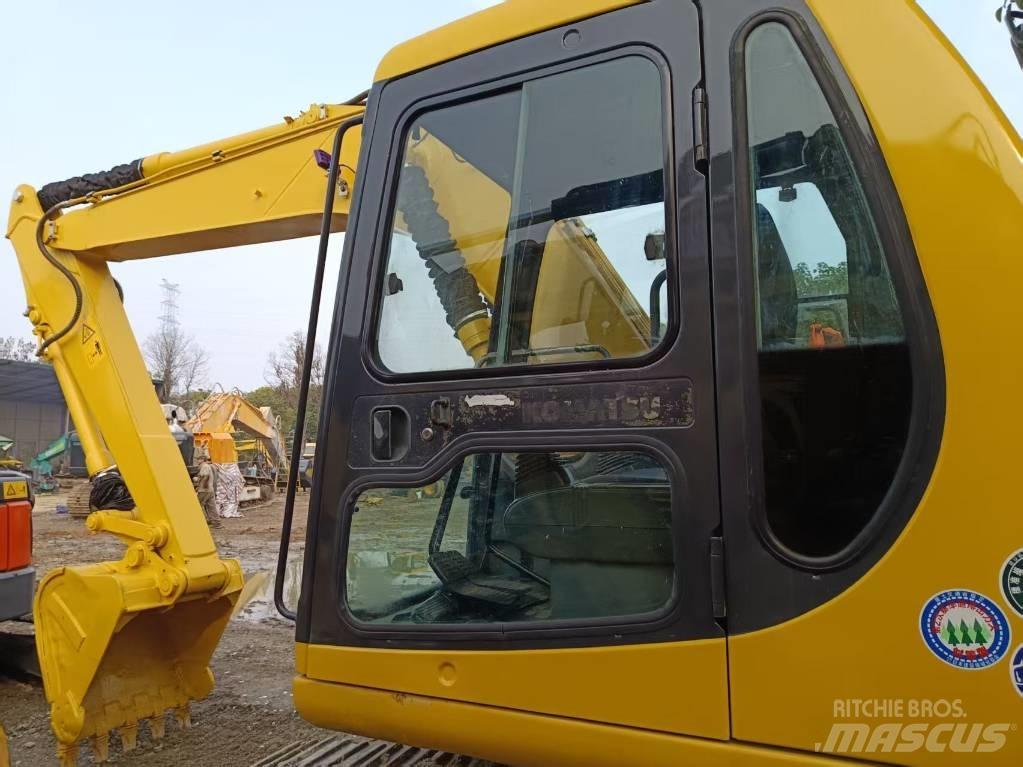 Komatsu PC120 Vidutinės galios ekskavatoriai 7-12 t