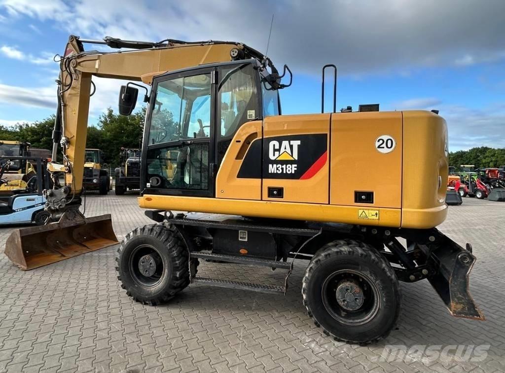 CAT M 318 F Ratiniai ekskavatoriai