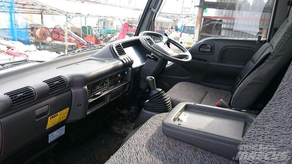 Isuzu KC-NKR66ED Savivarčių priekabų vilkikai