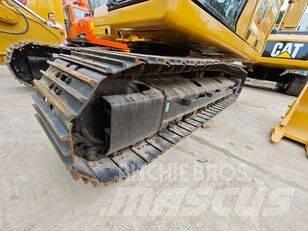 CAT 323 Vikšriniai ekskavatoriai
