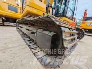 CAT 323 Vikšriniai ekskavatoriai