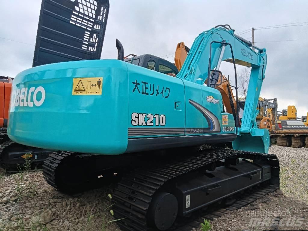 Kobelco SK 210 Vidutinės galios ekskavatoriai 7-12 t