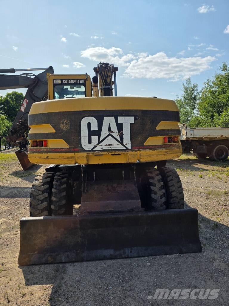 CAT 312 M Ratiniai ekskavatoriai