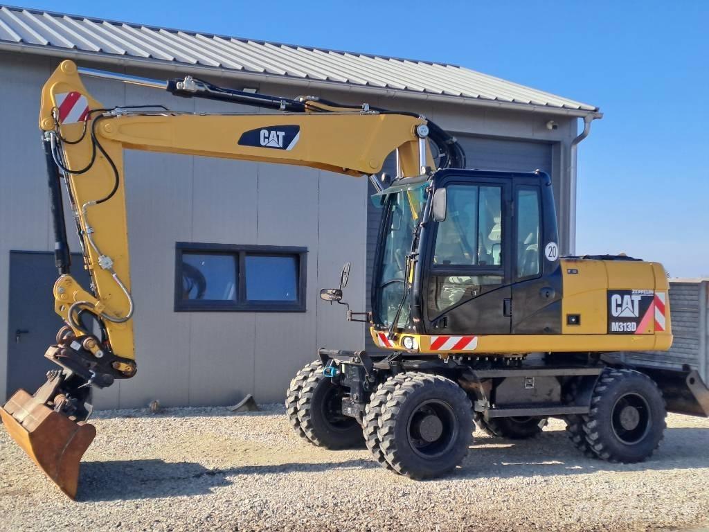 CAT M 313D Ratiniai ekskavatoriai