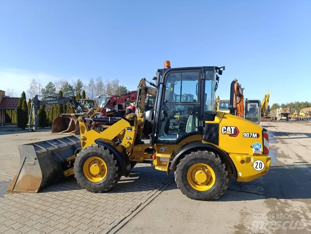 CAT 907 M Naudoti ratiniai krautuvai