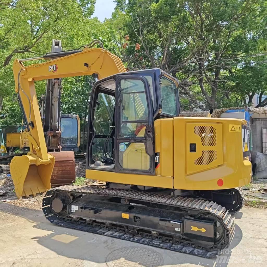 CAT 310 Vikšriniai ekskavatoriai