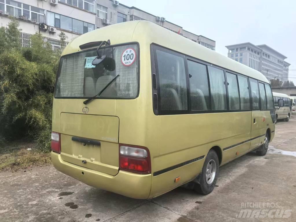 Toyota Coaster Tarpmiestiniai autobusai