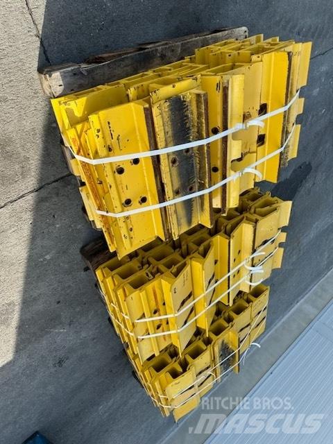 Komatsu d 85 plate Vikšrai, grandinės ir važiuoklės