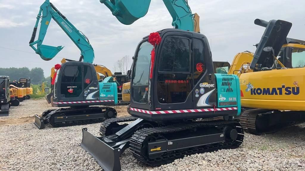 Kobelco SK 75 Vidutinės galios ekskavatoriai 7-12 t