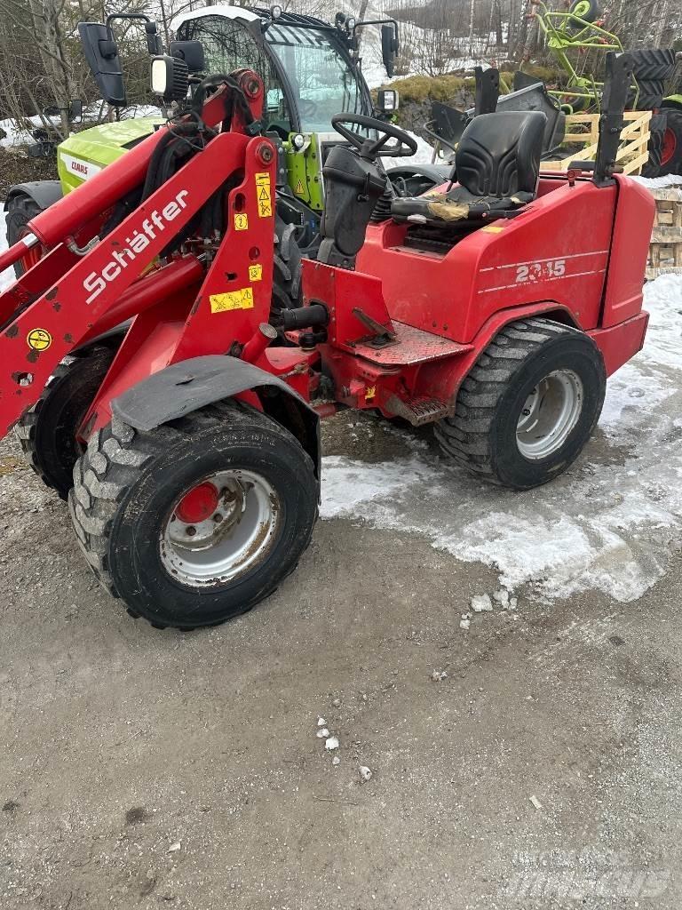 SCHAEFER 2345 Daugiafunkciniai pakrovėjai