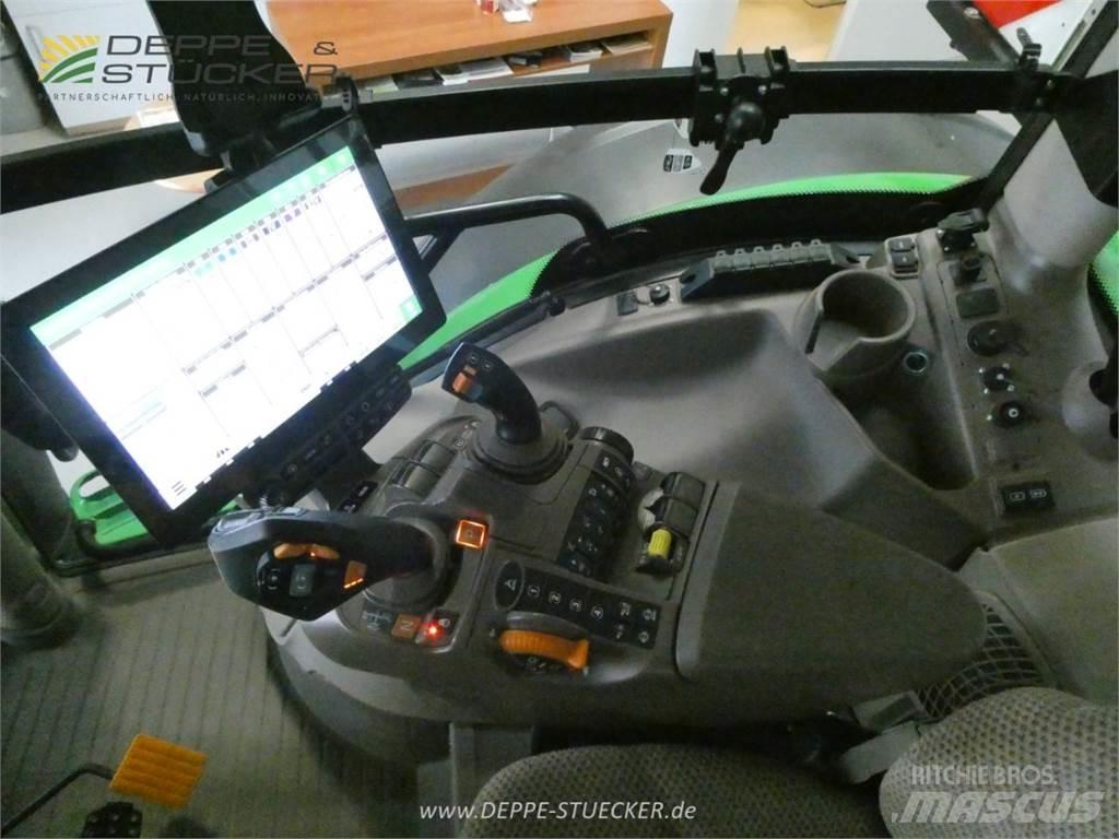 John Deere 6R 215 Traktoriai