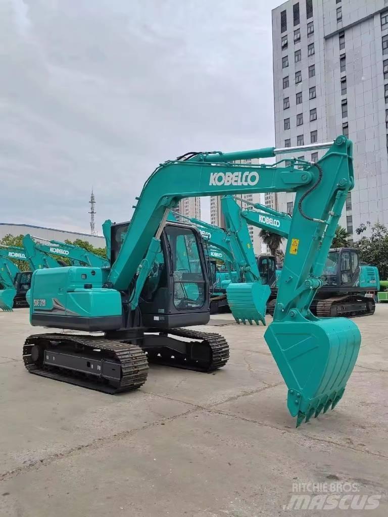 Kobelco SK 75 Vidutinės galios ekskavatoriai 7-12 t