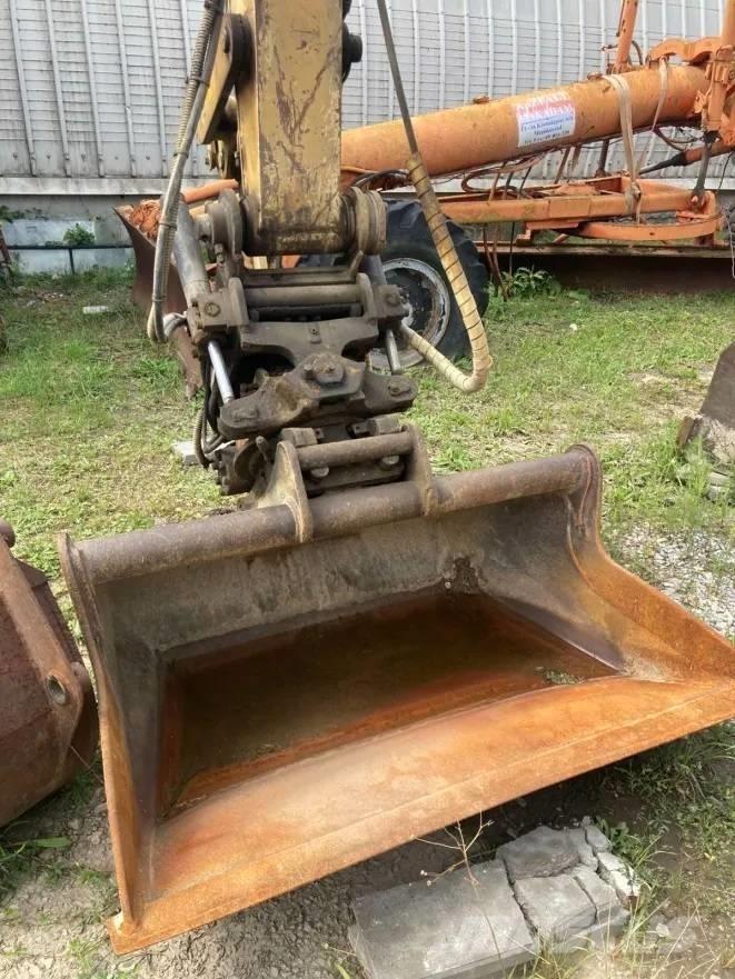 CAT M 312 Ratiniai ekskavatoriai