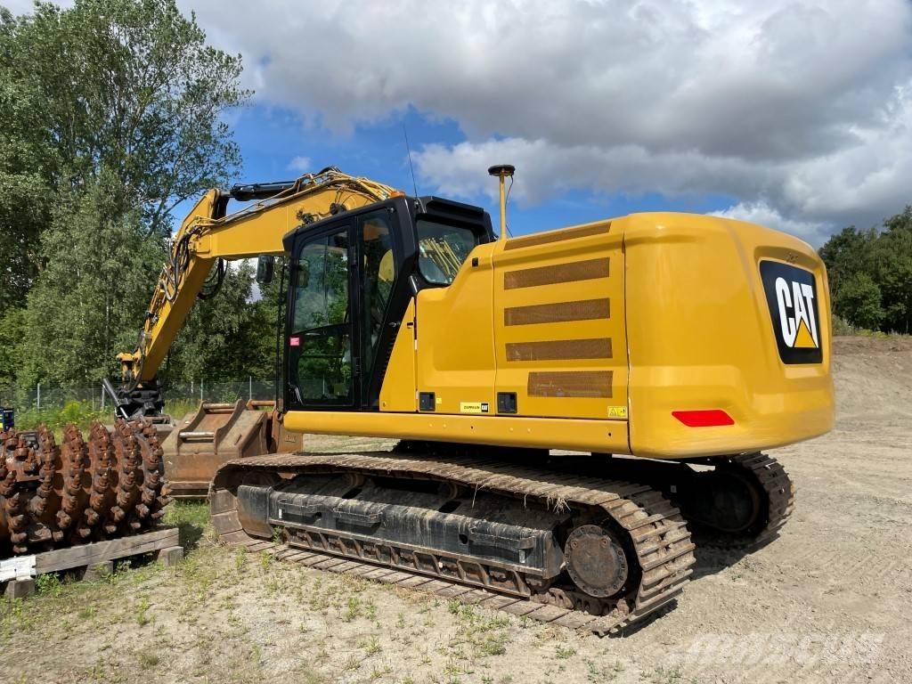 CAT 323 Vikšriniai ekskavatoriai