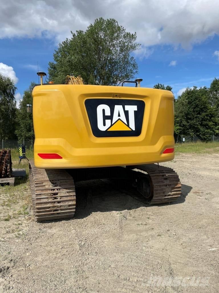 CAT 323 Vikšriniai ekskavatoriai