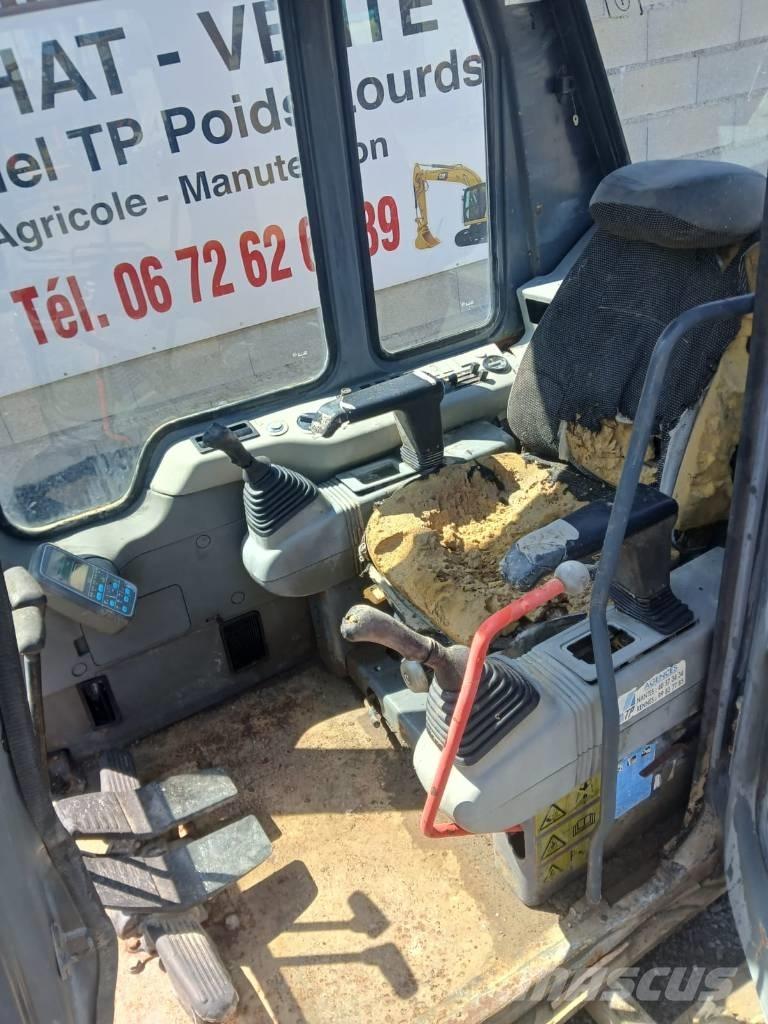 Komatsu PC 210 Kabinos ir interjeras