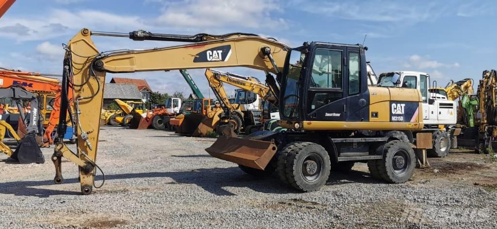 CAT M 315 D Ratiniai ekskavatoriai