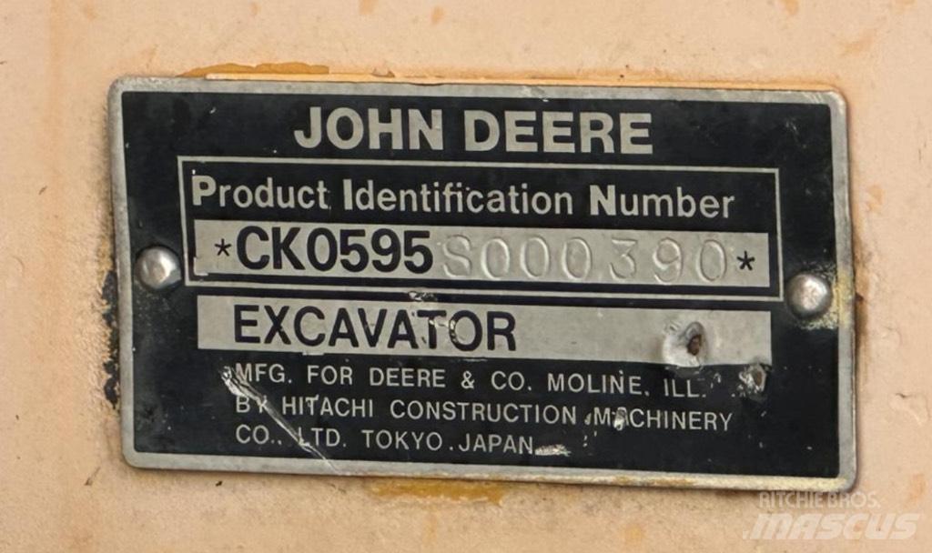 John Deere 595 Ratiniai ekskavatoriai