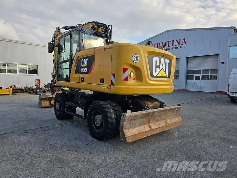 CAT M 318 F Ratiniai ekskavatoriai