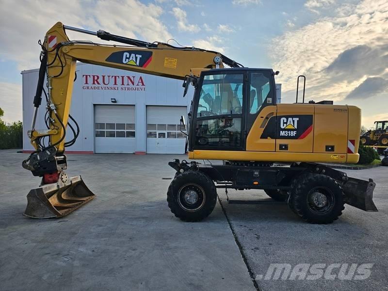 CAT M 318 F Ratiniai ekskavatoriai