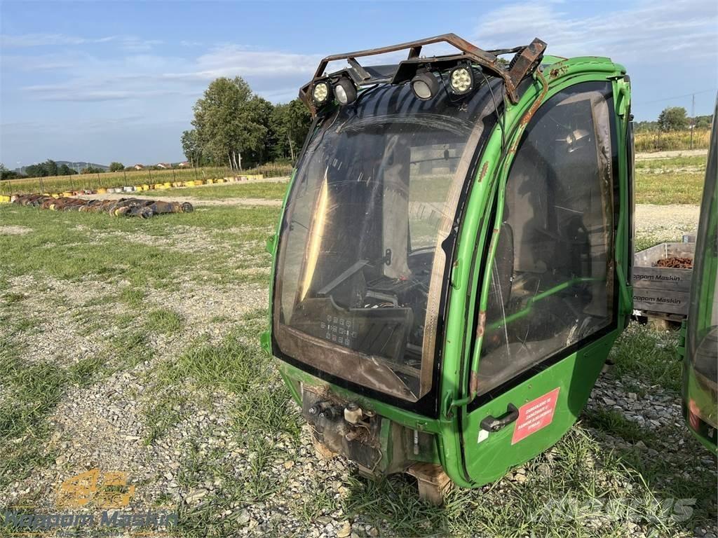 John Deere 1010E Kabinos ir salonai