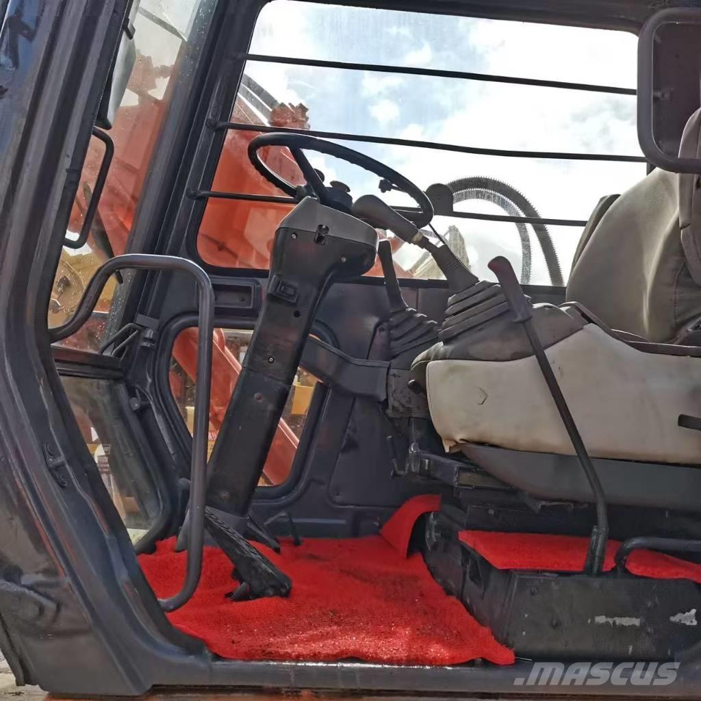 Hitachi EX 100 W D Ratiniai ekskavatoriai