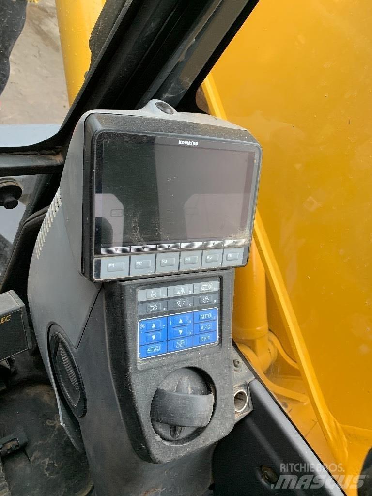 Komatsu 138 us -8 Vikšriniai ekskavatoriai