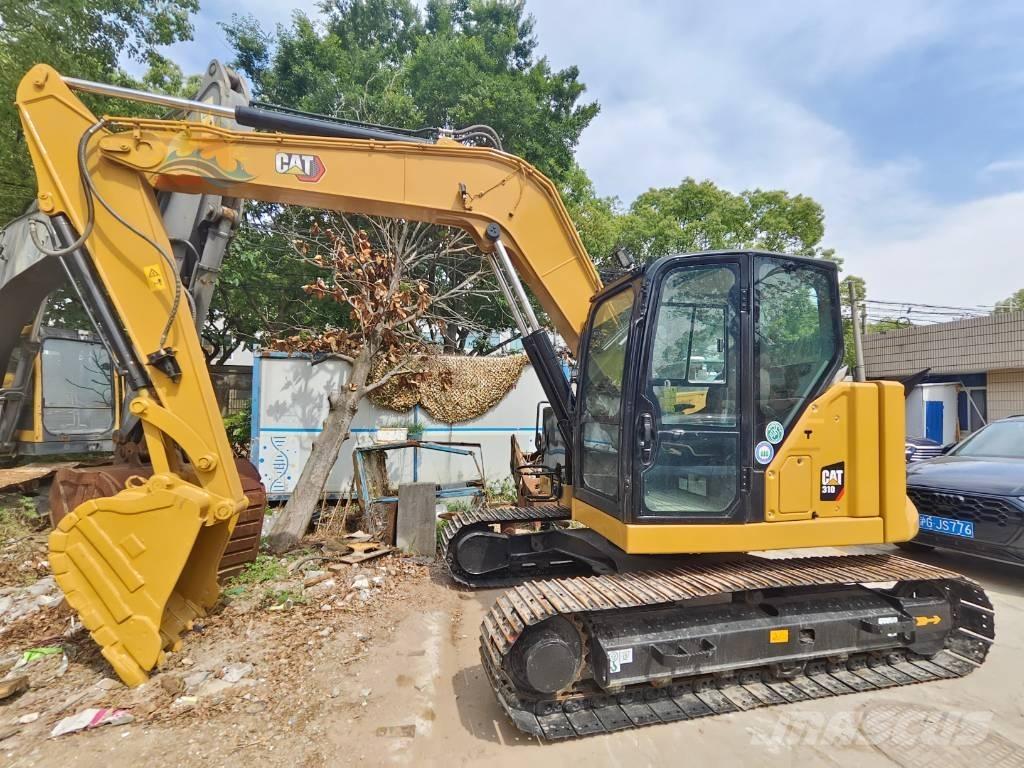 CAT 310 Vikšriniai ekskavatoriai