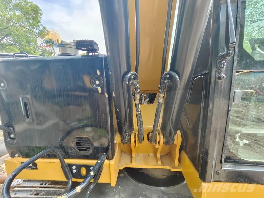 CAT 310 Vikšriniai ekskavatoriai