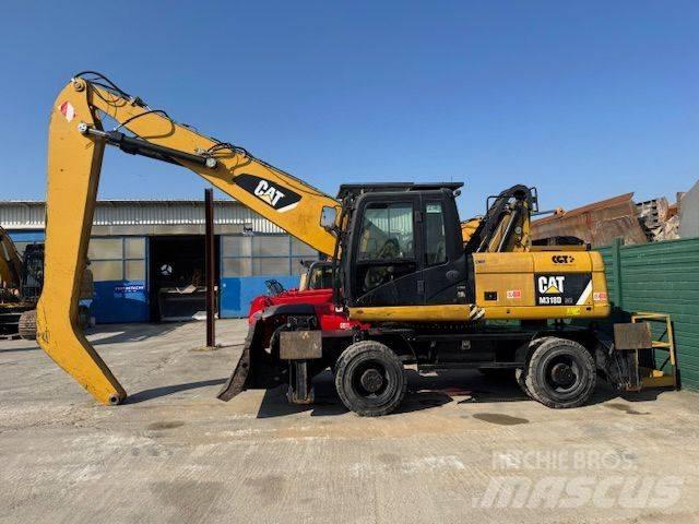 CAT 318D MH Krovimas/Kėlimas - Kita