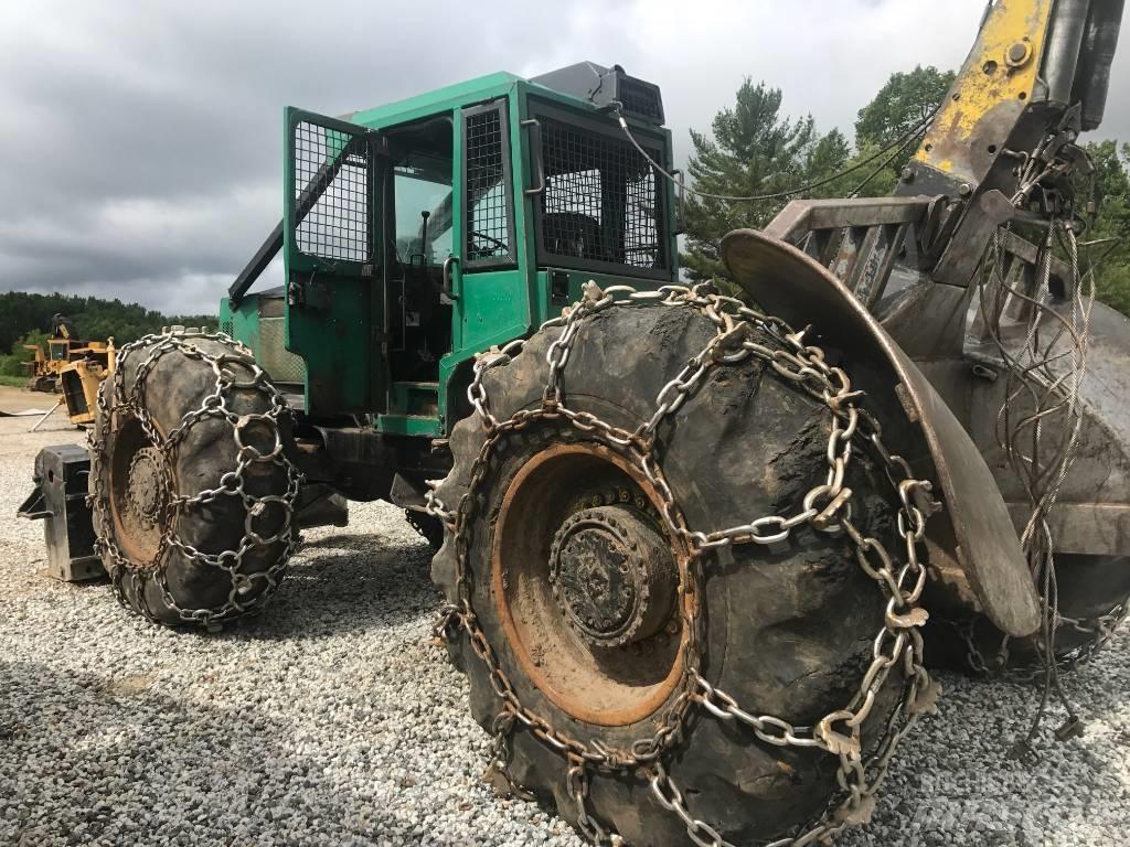 Timberjack 450C Skiedrovežiai
