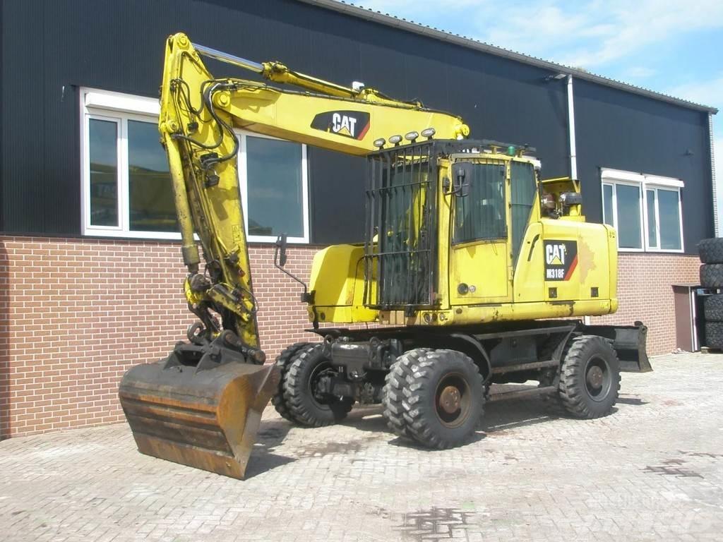 CAT M318F Ratiniai ekskavatoriai