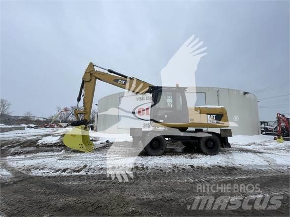 CAT M318D Ratiniai ekskavatoriai