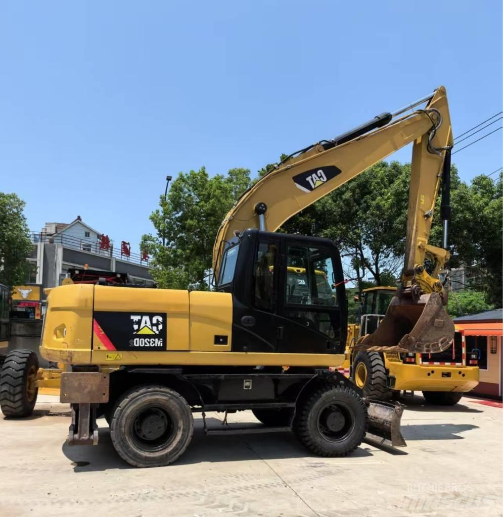 CAT M 320 Ratiniai ekskavatoriai