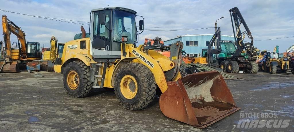 New Holland W 130 Naudoti ratiniai krautuvai