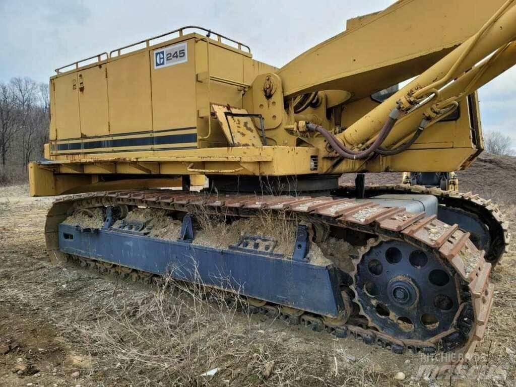 CAT 245 Vikšriniai ekskavatoriai