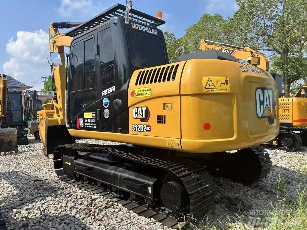 CAT 312 DGC Vikšriniai ekskavatoriai