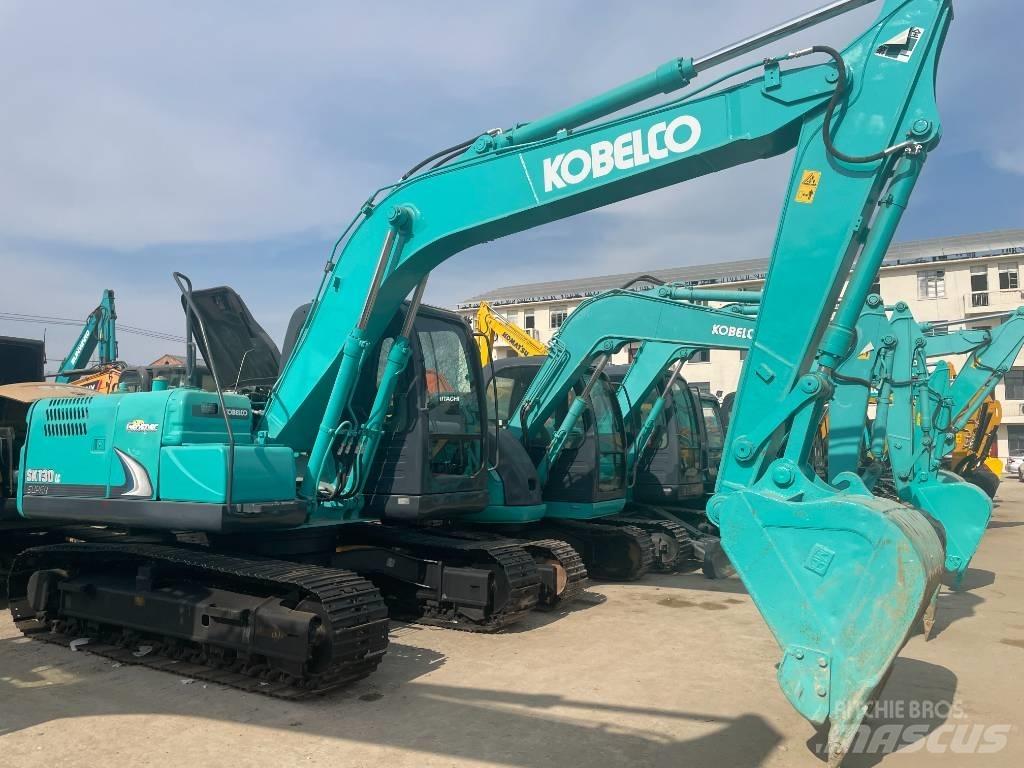 Kobelco 130 Vidutinės galios ekskavatoriai 7-12 t