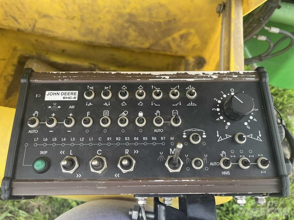John Deere 840 i Prikabinami purkštuvai