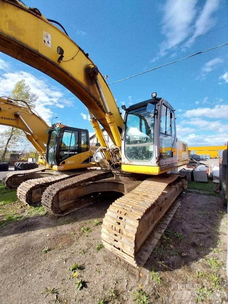 New Holland E 305 Vikšriniai ekskavatoriai