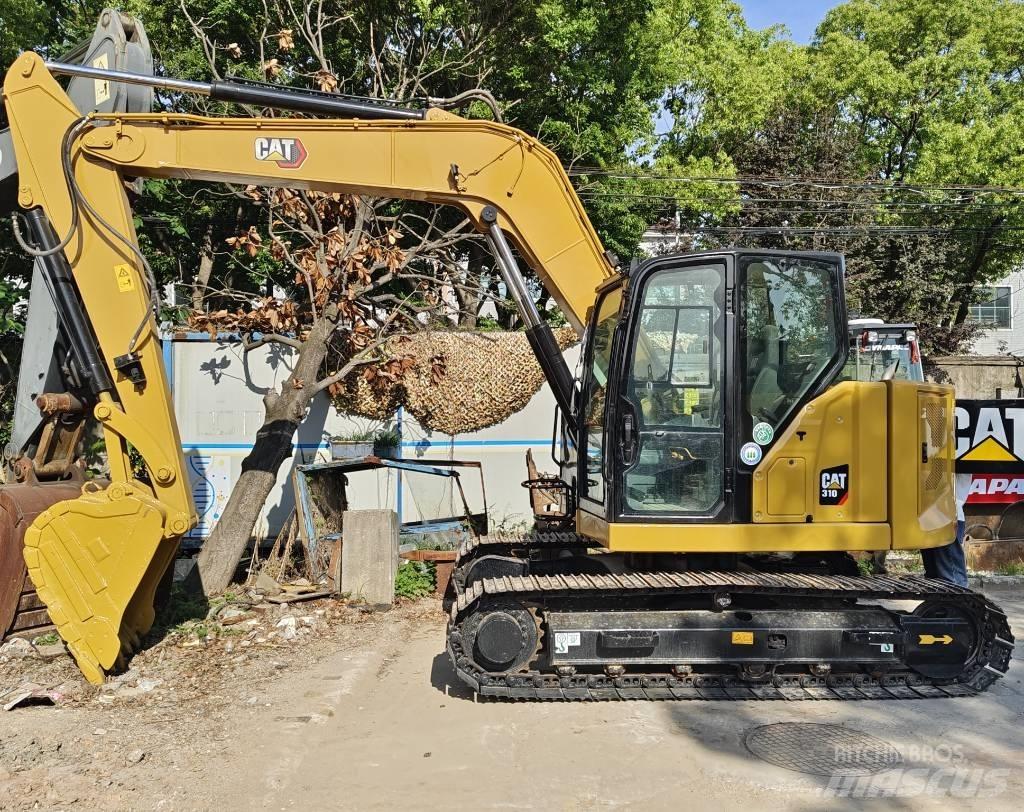 CAT 310 Vikšriniai ekskavatoriai
