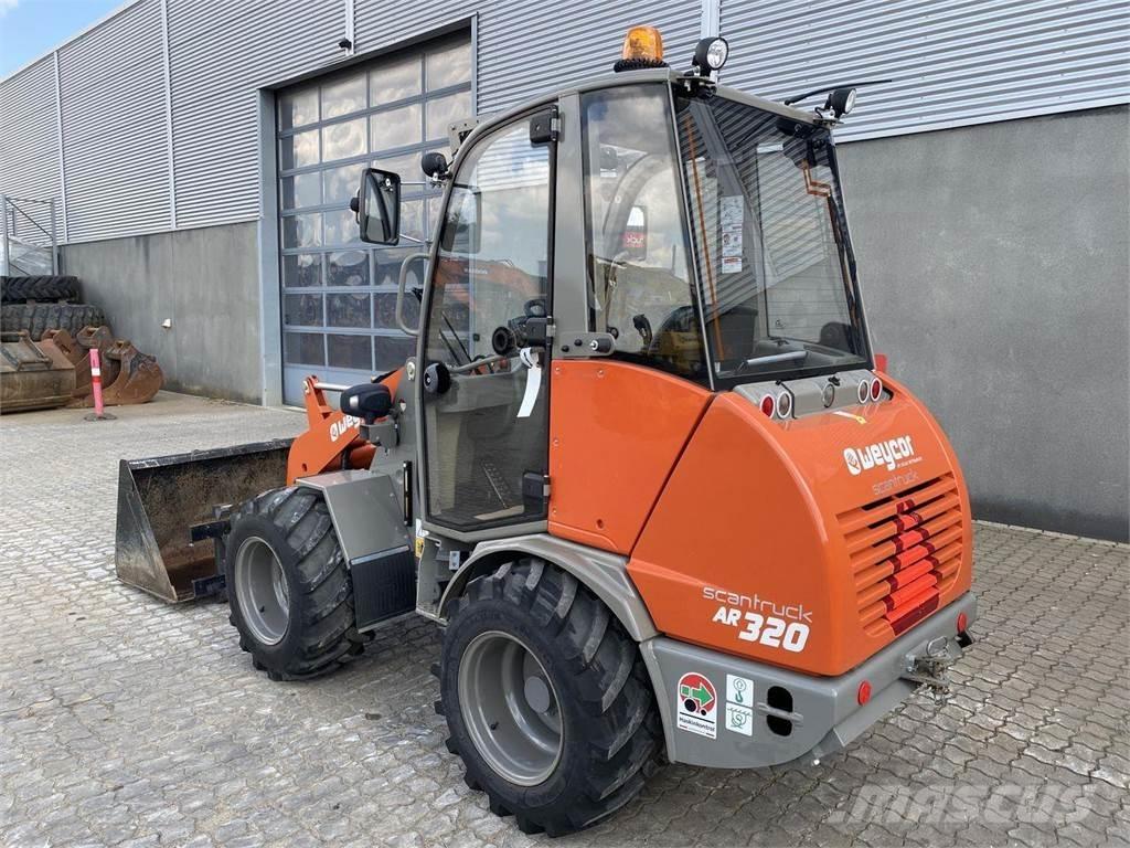 Weycor AR320 Cab Daugiafunkciniai pakrovėjai