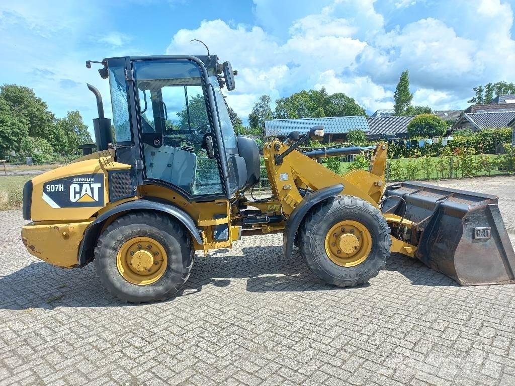 CAT 907 H Naudoti ratiniai krautuvai