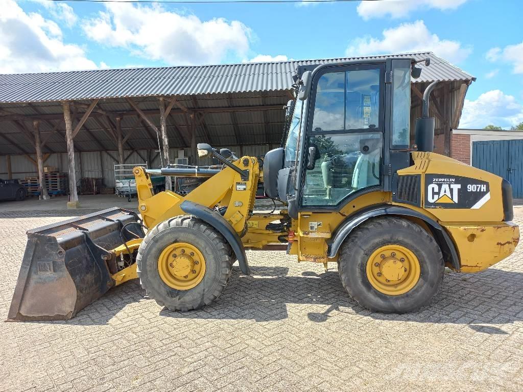 CAT 907 H Naudoti ratiniai krautuvai