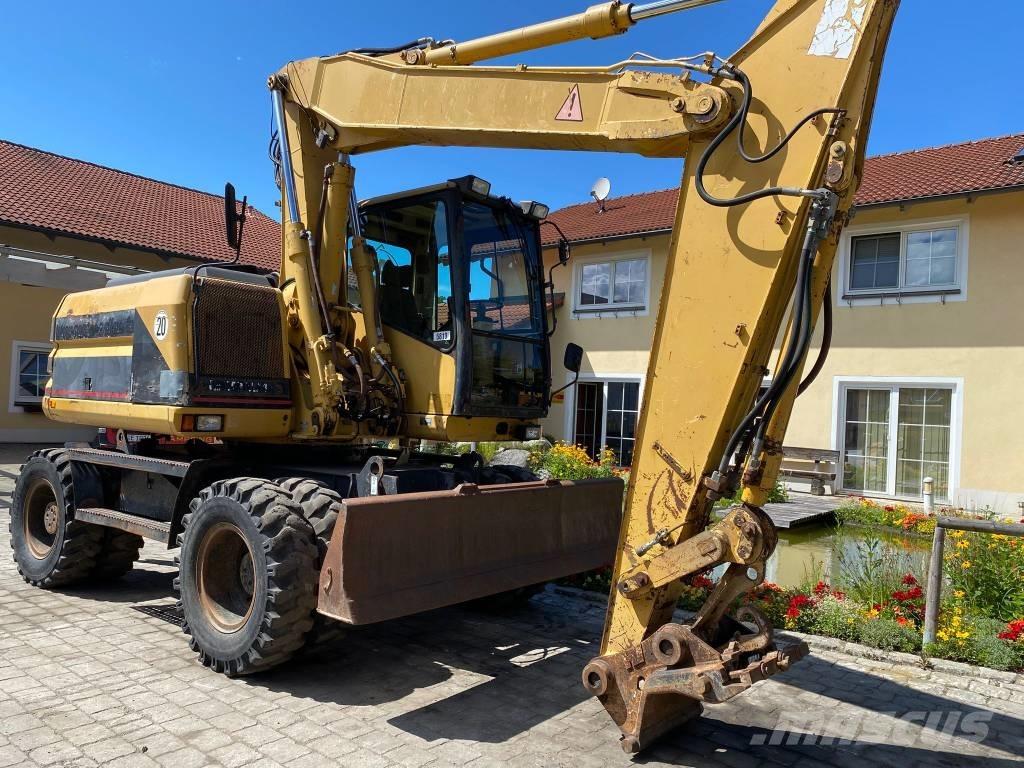 CAT M 312 Ratiniai ekskavatoriai