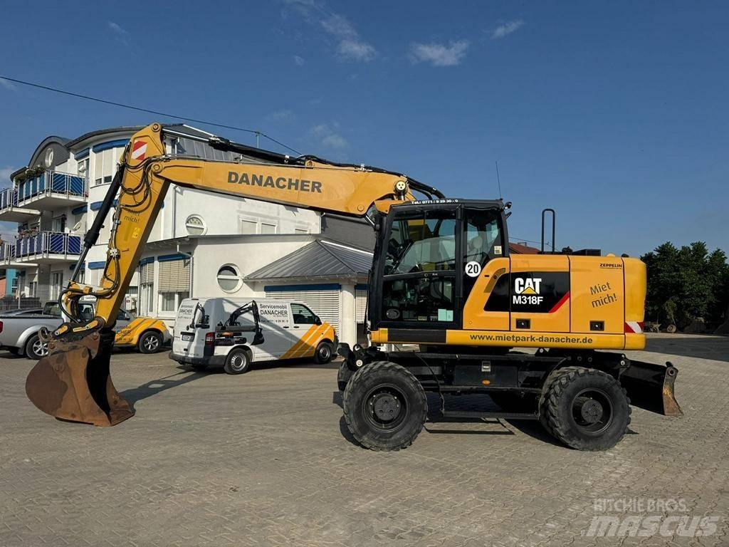 CAT M 318 F Ratiniai ekskavatoriai