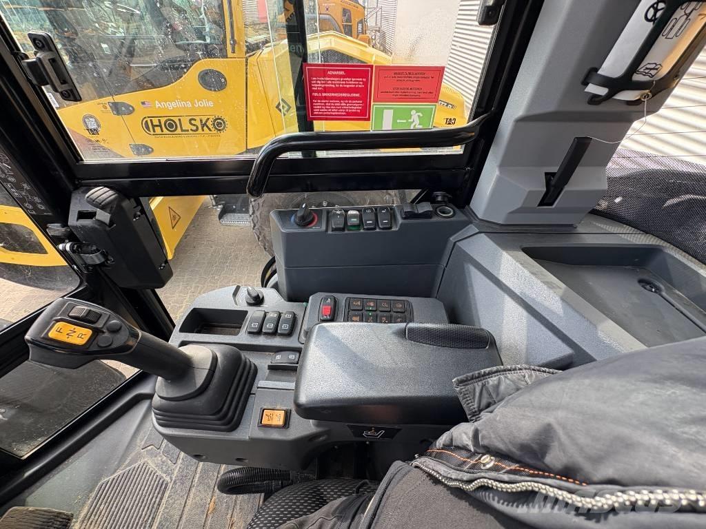 CAT 906 Naudoti ratiniai krautuvai