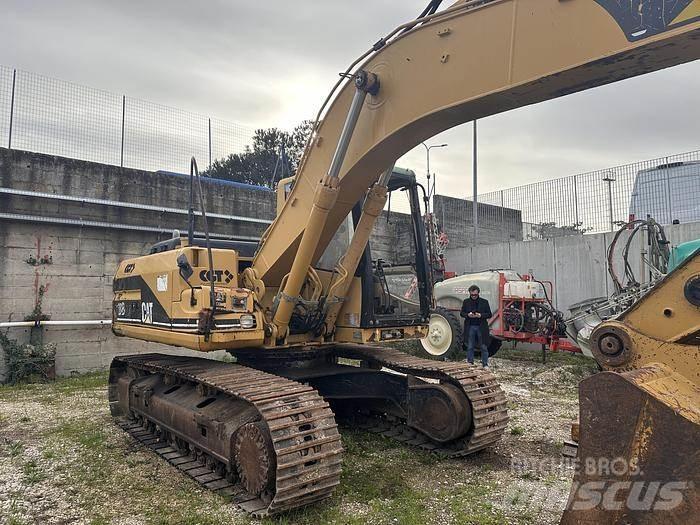 CAT 318B Specialūs ekskavatoriai
